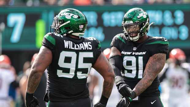 New York Jets DL John Franklin-Myers and Quinnen Williams celebrate sack